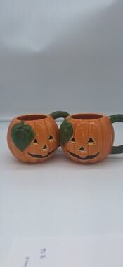 Set of Lillian Vernon Jack O Lantern Ceramic Mugs.